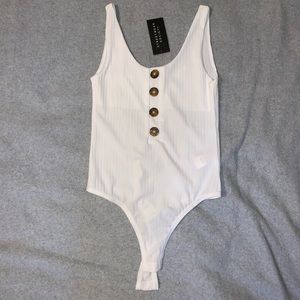 White Bodysuit w/ Brown Buttons